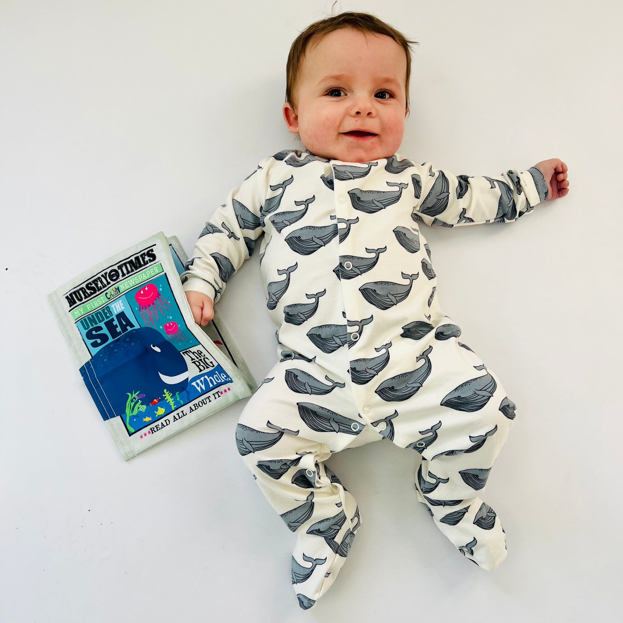 Eddie & Bee organic cotton Baby sleepsuit  in Cream " Whale " print.