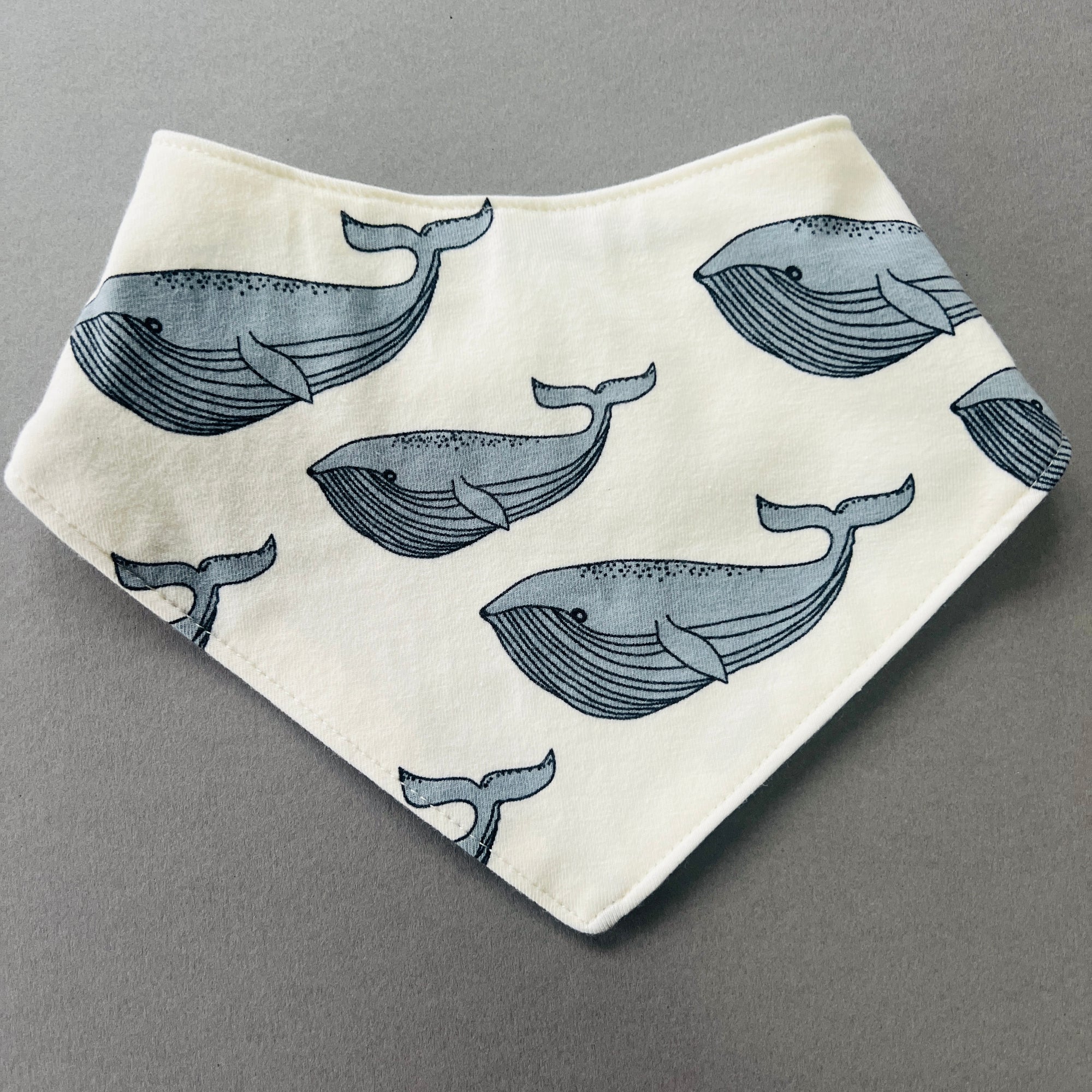 Eddie & Bee organic cotton Baby Dribble bib  in Cream "Whale" print.