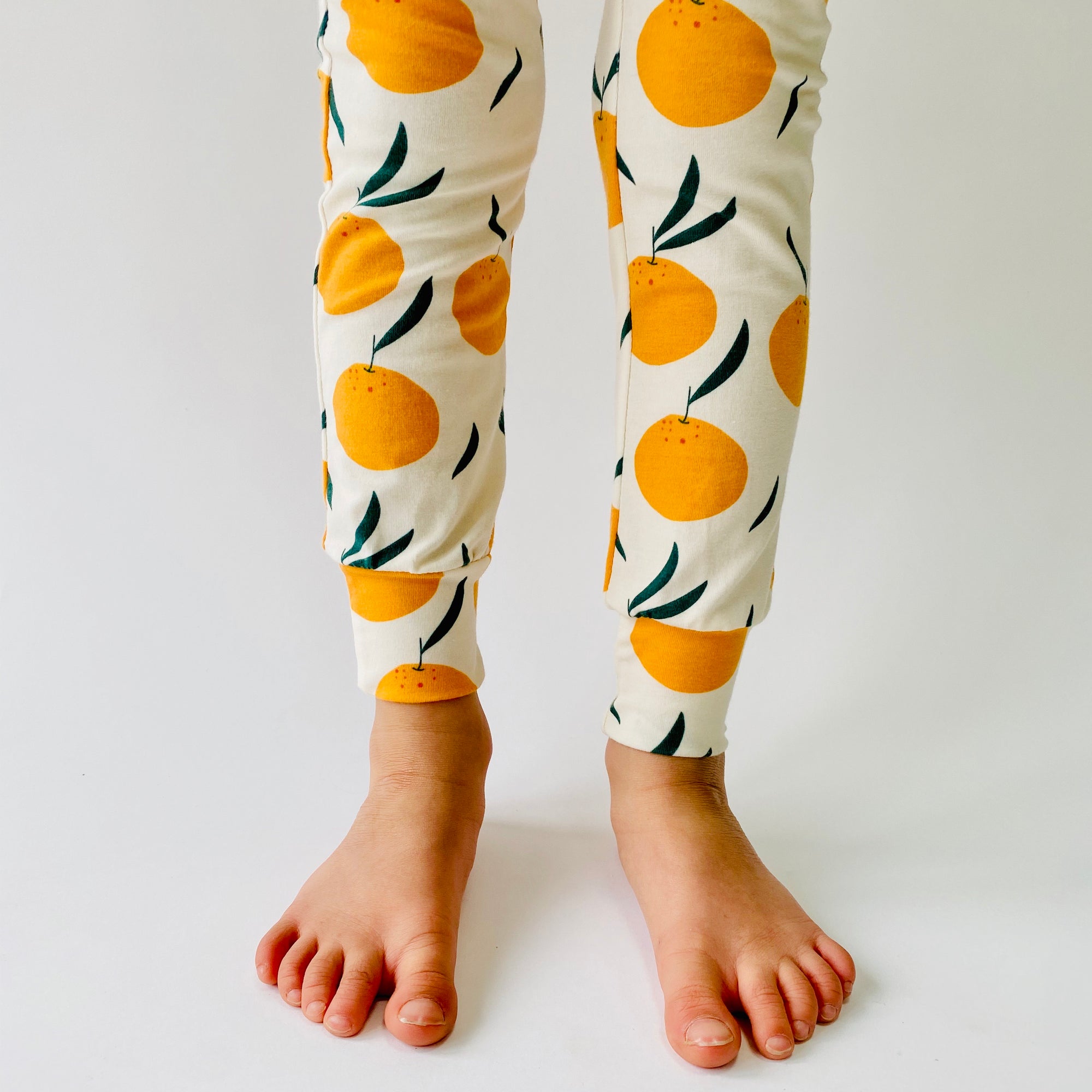 Eddie & Bee organic cotton leggings in Cream "Clementine Grove" print.