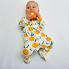 Eddie & Bee organic cotton Baby sleepsuit  in Cream " Clementine grove " print.