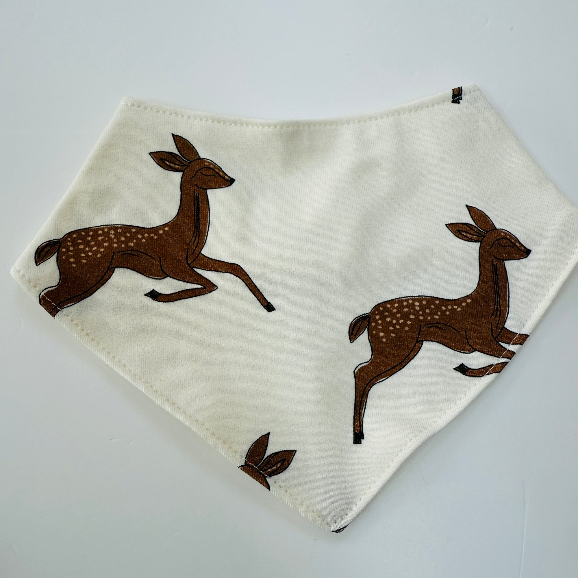 Eddie & Bee organic cotton Baby Dribble bib  in Cream "Deer" print.