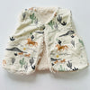 Fully Reversible fleecy gilet lined with your choice of print.