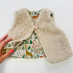 Fully Reversible fleecy gilet lined with your choice of print.