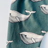 Eddie & Bee organic cotton leggings in Forest Green “Whales" print.
