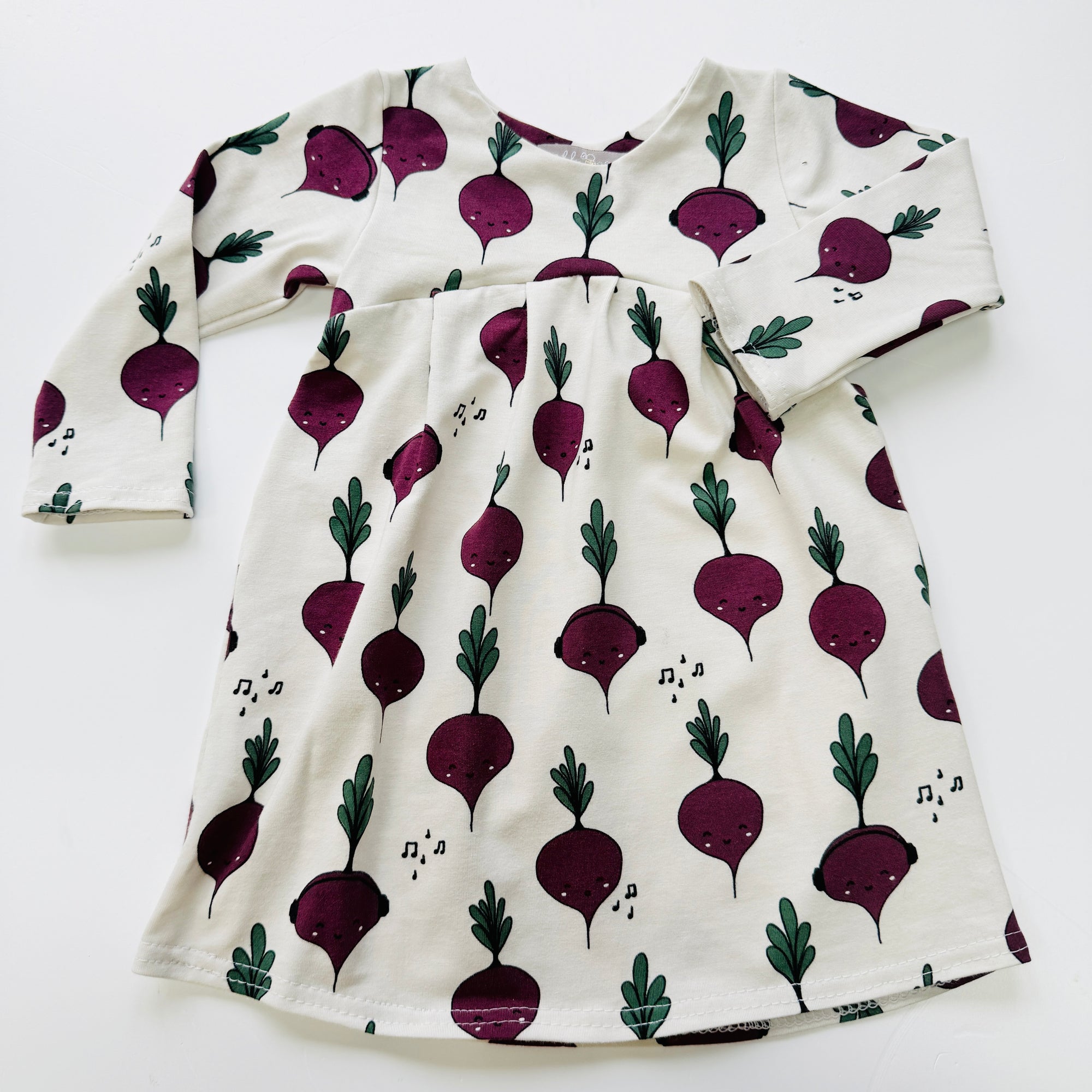 Eddie & Bee organic cotton long sleeved dress in Cream “Beetroot” print