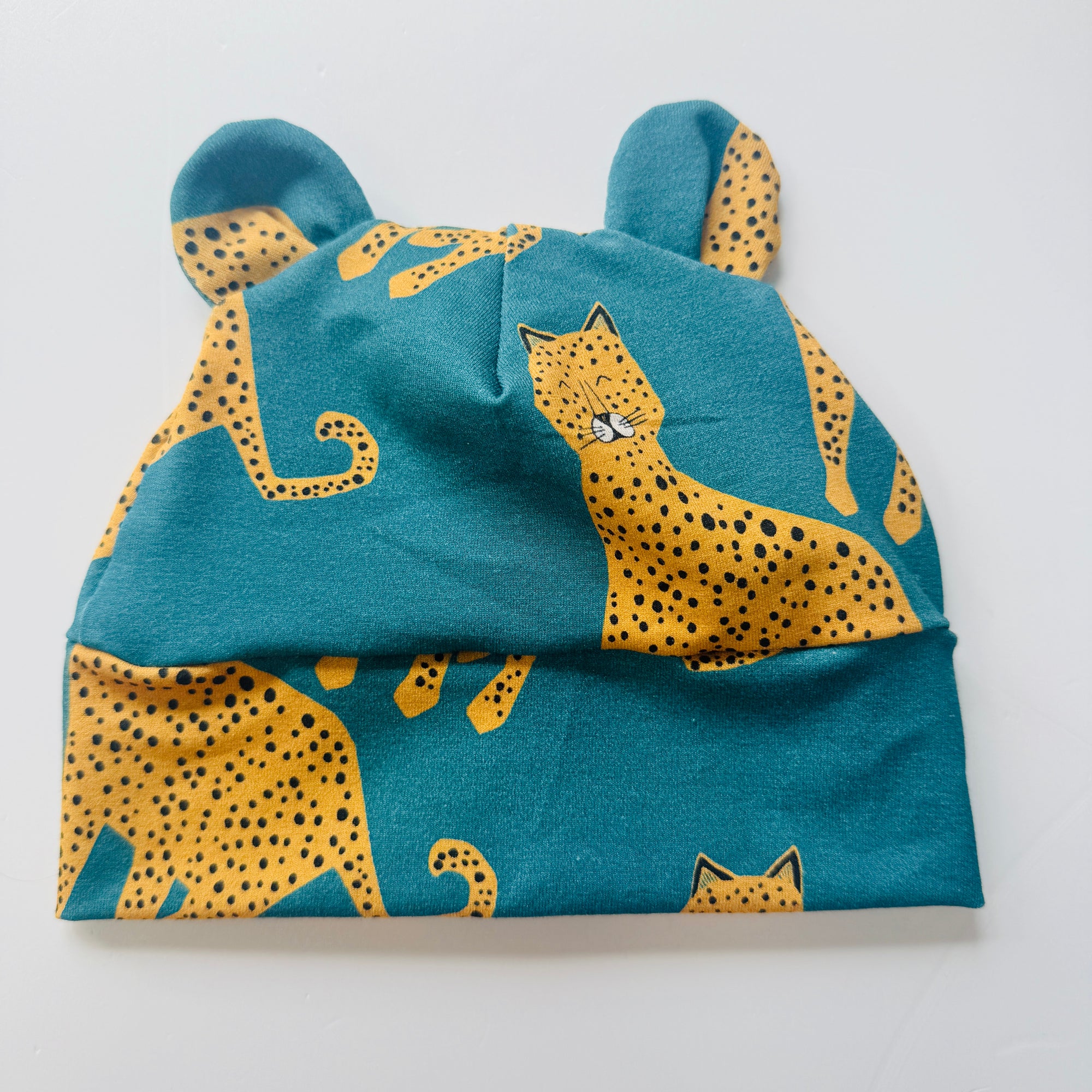 Limited Edition-Eddie & Bee organic cotton Baby hat  in Cream “Teal Happy Leopard " print.