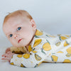 Eddie & Bee organic cotton Baby sleepsuit  in Cream " Lemon grove " print.