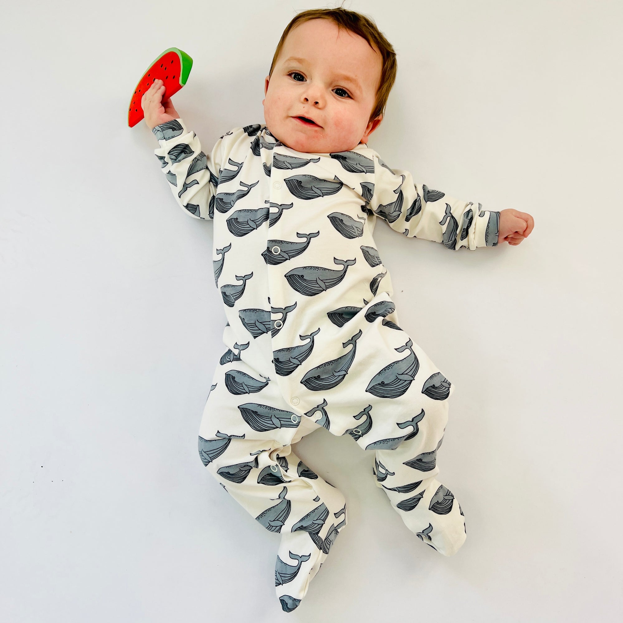 Seconds of Eddie & Bee organic cotton Baby sleep suit  in creme " Whale " print.