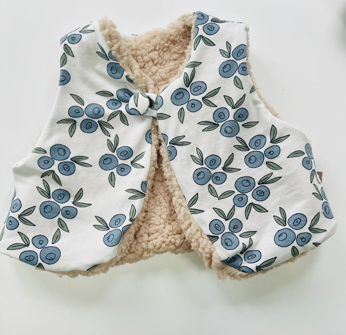 Seconds of Eddie & Bee Baby Fully reversible gilet in Blueberry print