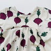 Eddie & Bee organic cotton long sleeved dress in Cream “Beetroot” print