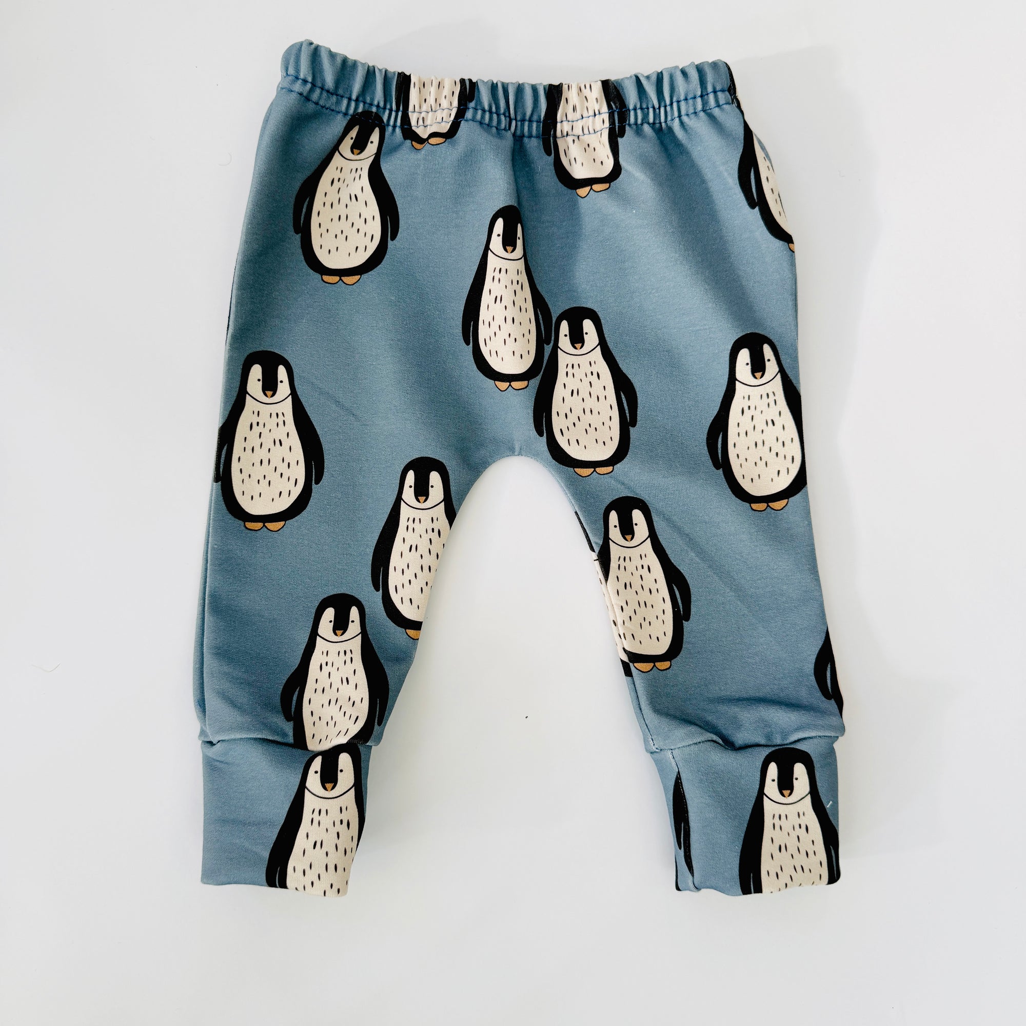 Eddie & Bee organic cotton leggings in Arctic Blue "Happy Penguins" print. (Thicker Jersey Fabric)