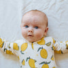 Eddie & Bee organic cotton Baby sleepsuit  in Cream " Lemon grove " print.