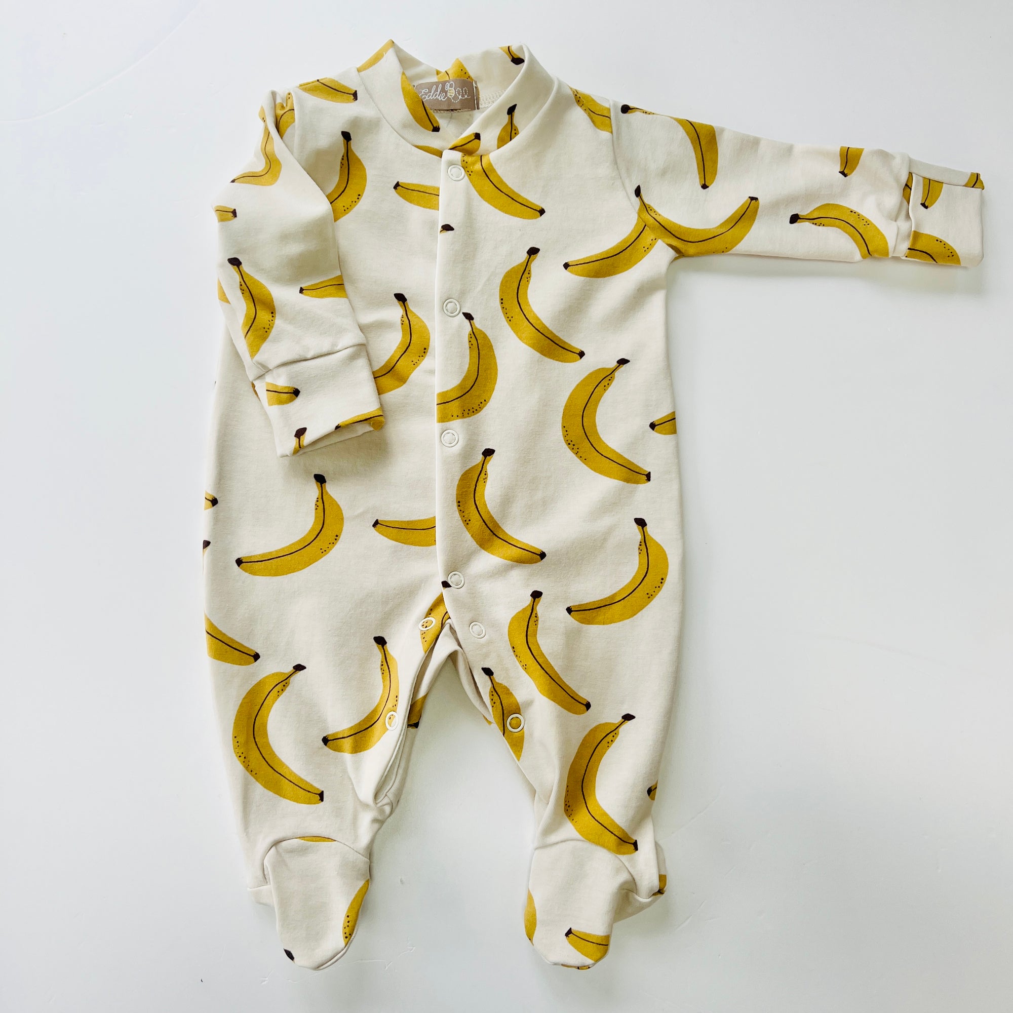Seconds of Eddie & Bee organic cotton Baby sleep suit  in Cream " Banana " print.