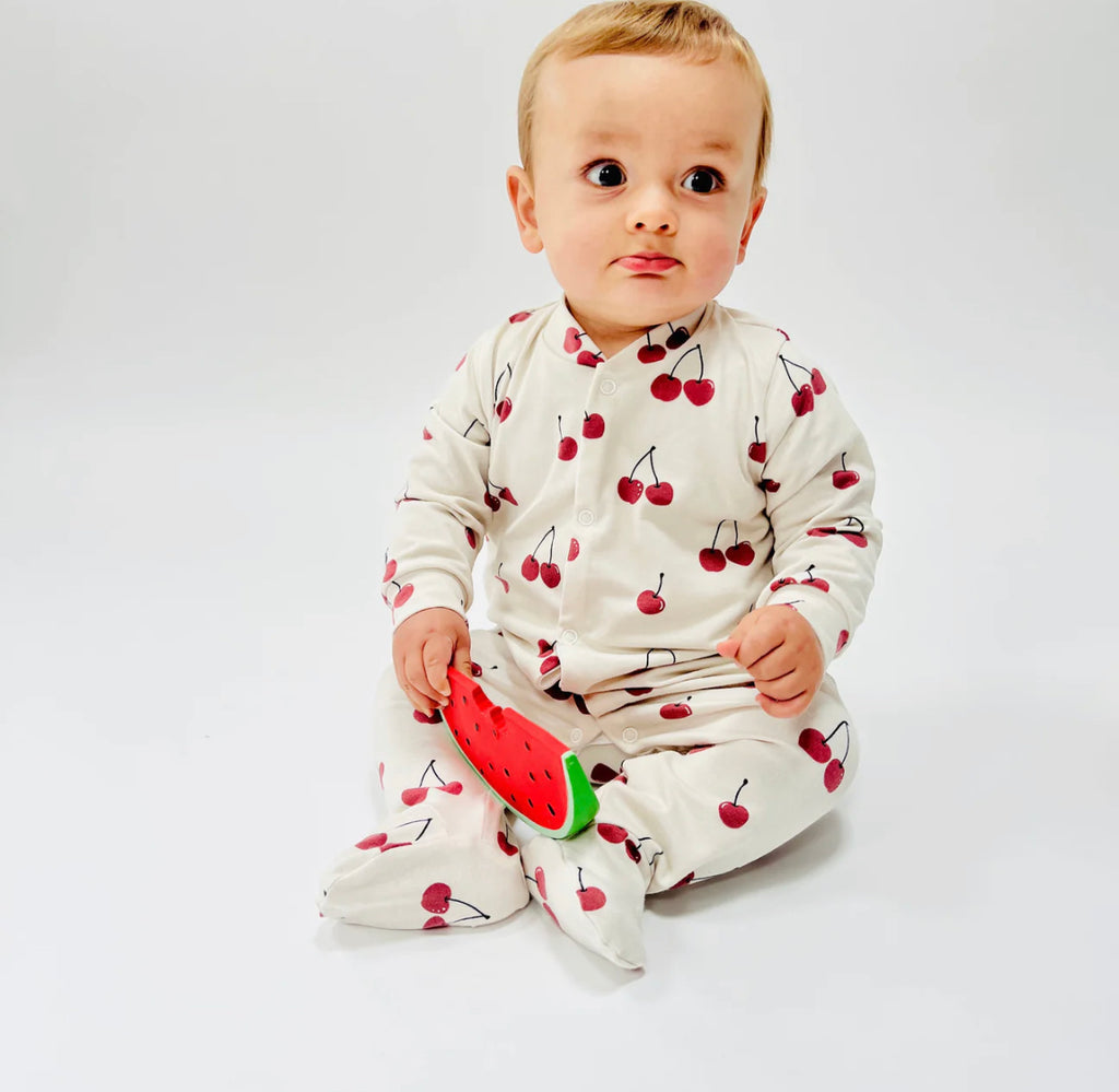Eddie & Bee organic cotton Baby sleepsuit  in Oat " Cherries " print.