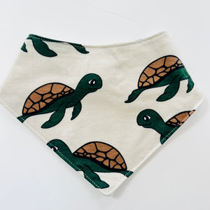 Eddie & Bee organic cotton Baby Dribble bib  in Oat "Swimming Turtle " print.