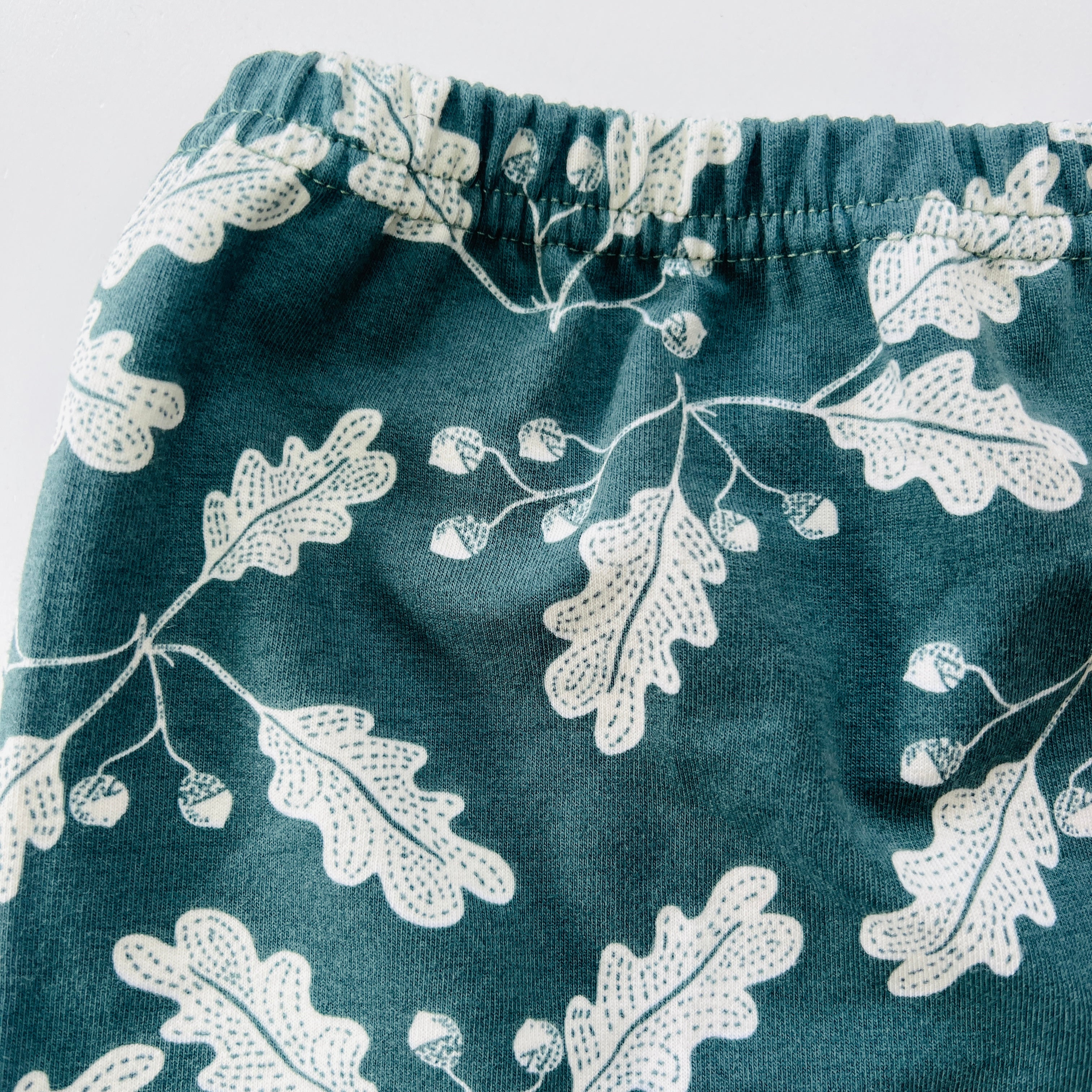 Eddie & Bee organic cotton leggings in Pine "Acorn Leaves" print. (Thicker Jersey Fabric)