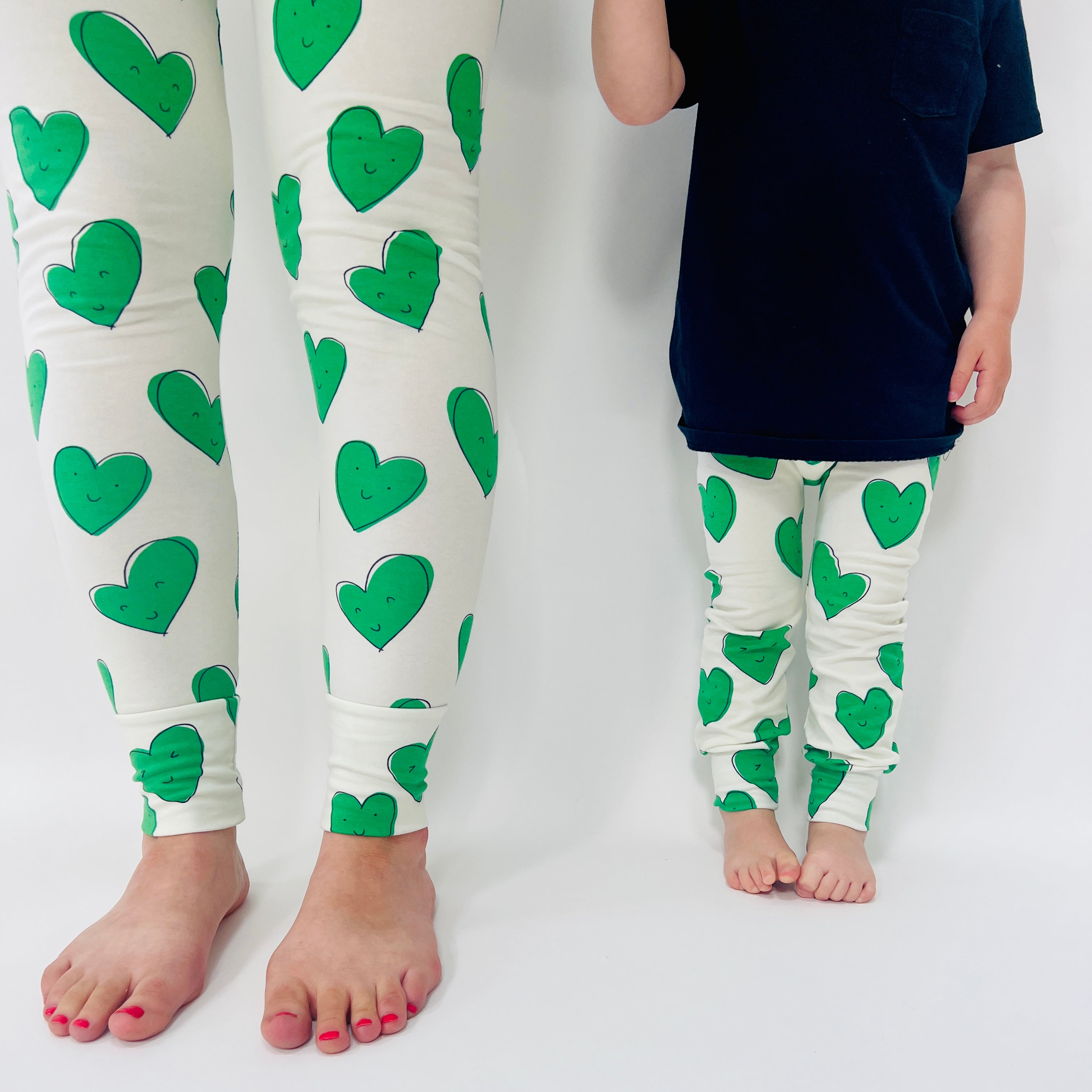 Eddie & Bee organic cotton leggings in Green "Happy Hearts" print.