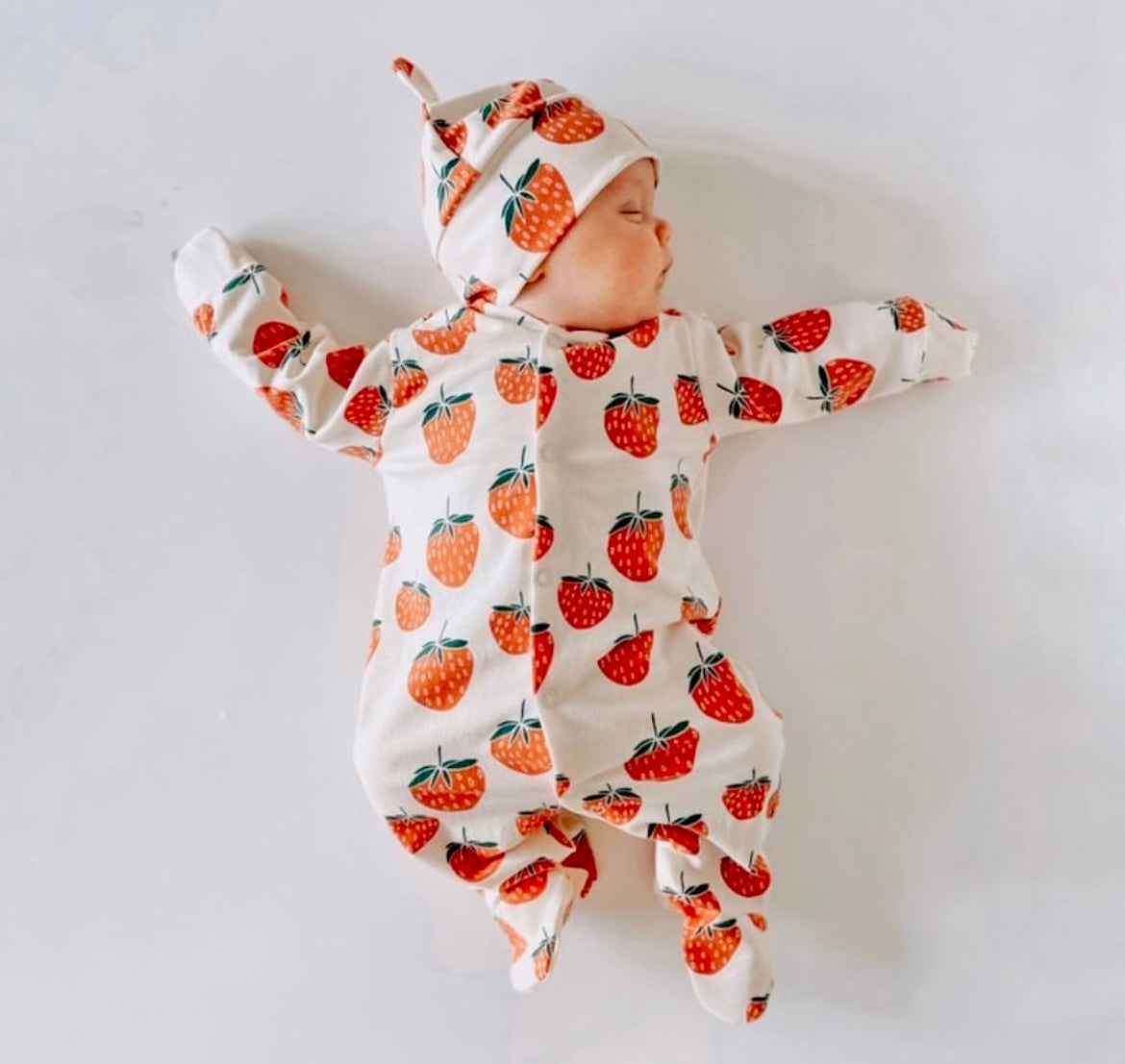 Seconds of Eddie & Bee organic cotton Baby sleep suit  in Cream " Strawberry " print.