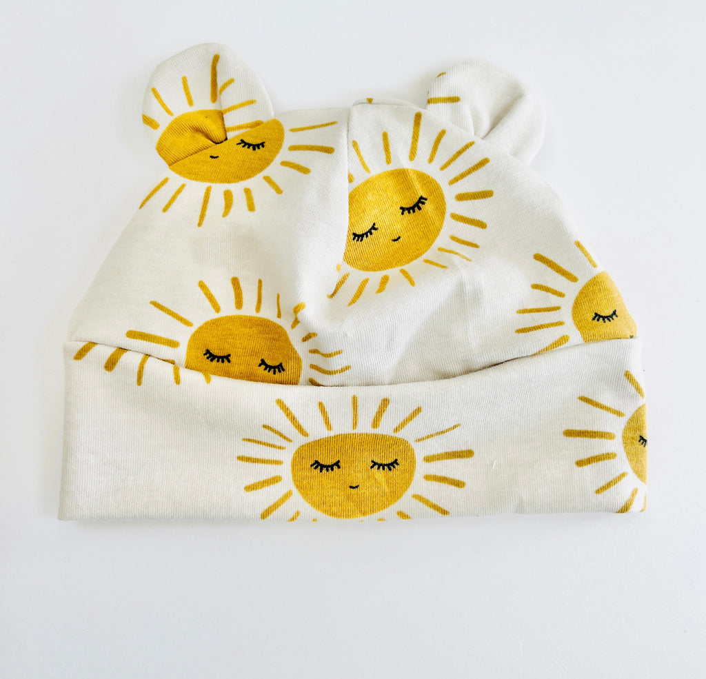 Eddie & Bee organic cotton Baby hat with ears  in Oat "Sunny” print.