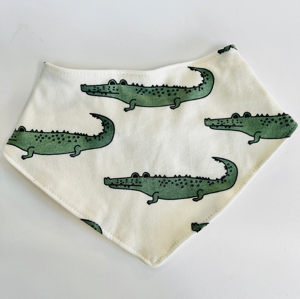 Eddie & Bee organic cotton Baby Dribble bib  in Cream "Enormous Crocodile" print.