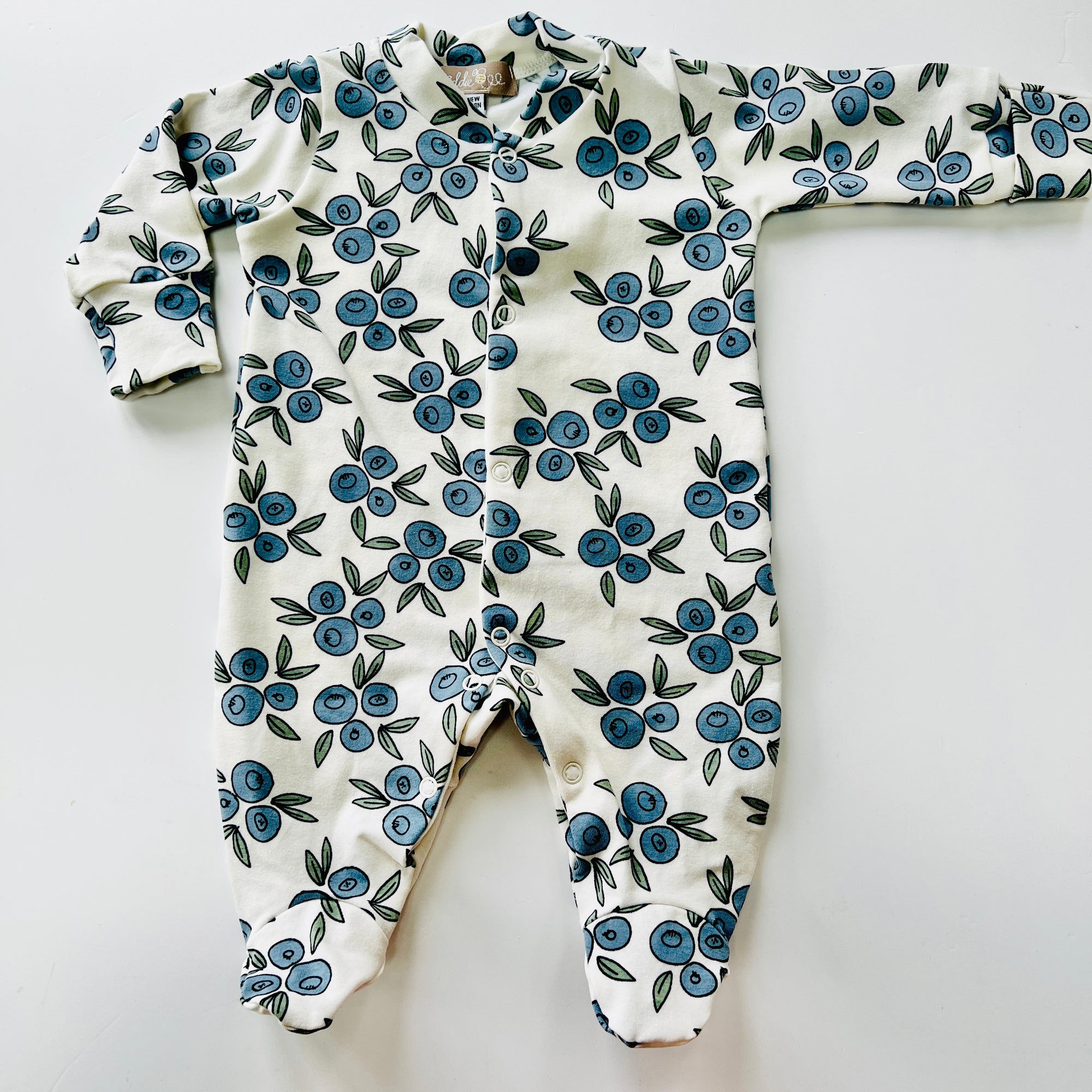 Seconds of Eddie & Bee organic cotton Baby sleep suit  in Cream " blueberry" print.