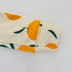 Eddie & Bee organic cotton Baby sleepsuit  in Cream " Clementine grove " print.