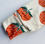 Eddie & Bee organic cotton sleepsuit  in Cream "Strawberry" print.