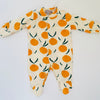 Eddie & Bee organic cotton Baby sleepsuit  in Cream " Clementine grove " print.