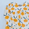 Eddie & Bee organic cotton long sleeved dress in Cream “Clementine Grove” print