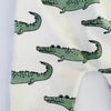 Eddie & Bee organic cotton leggings in cream“Enormous Crocodile" print.