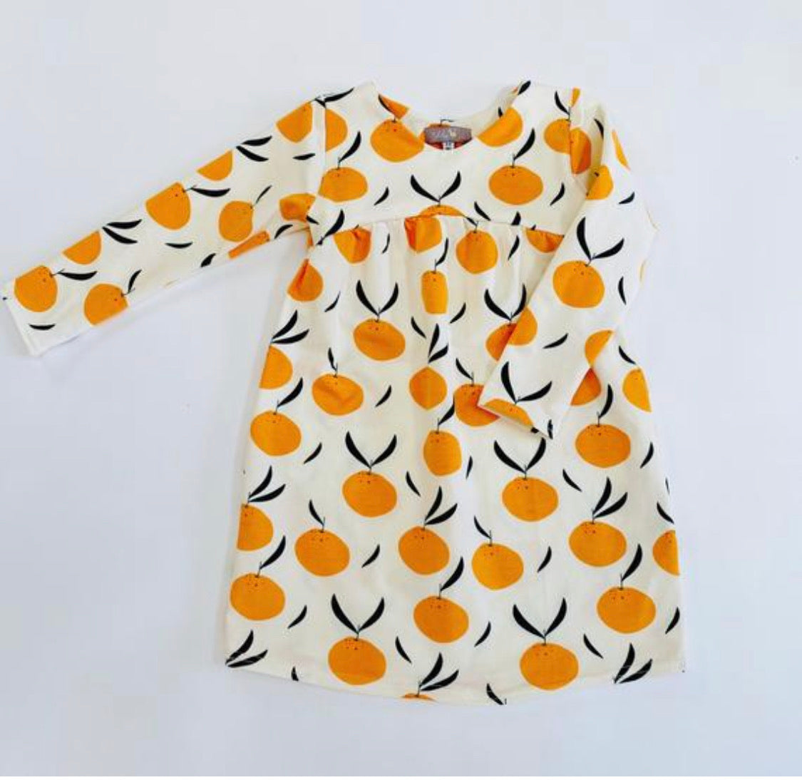 Eddie & Bee organic cotton long sleeved dress in Cream “Clementine Grove” print