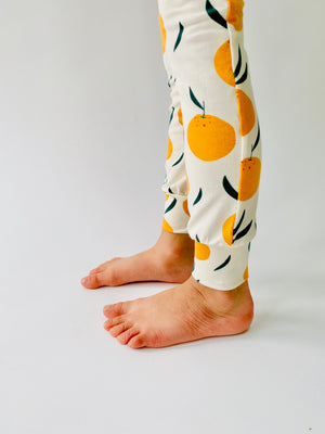 Eddie & Bee organic cotton leggings in Cream "Clementine Grove" print.