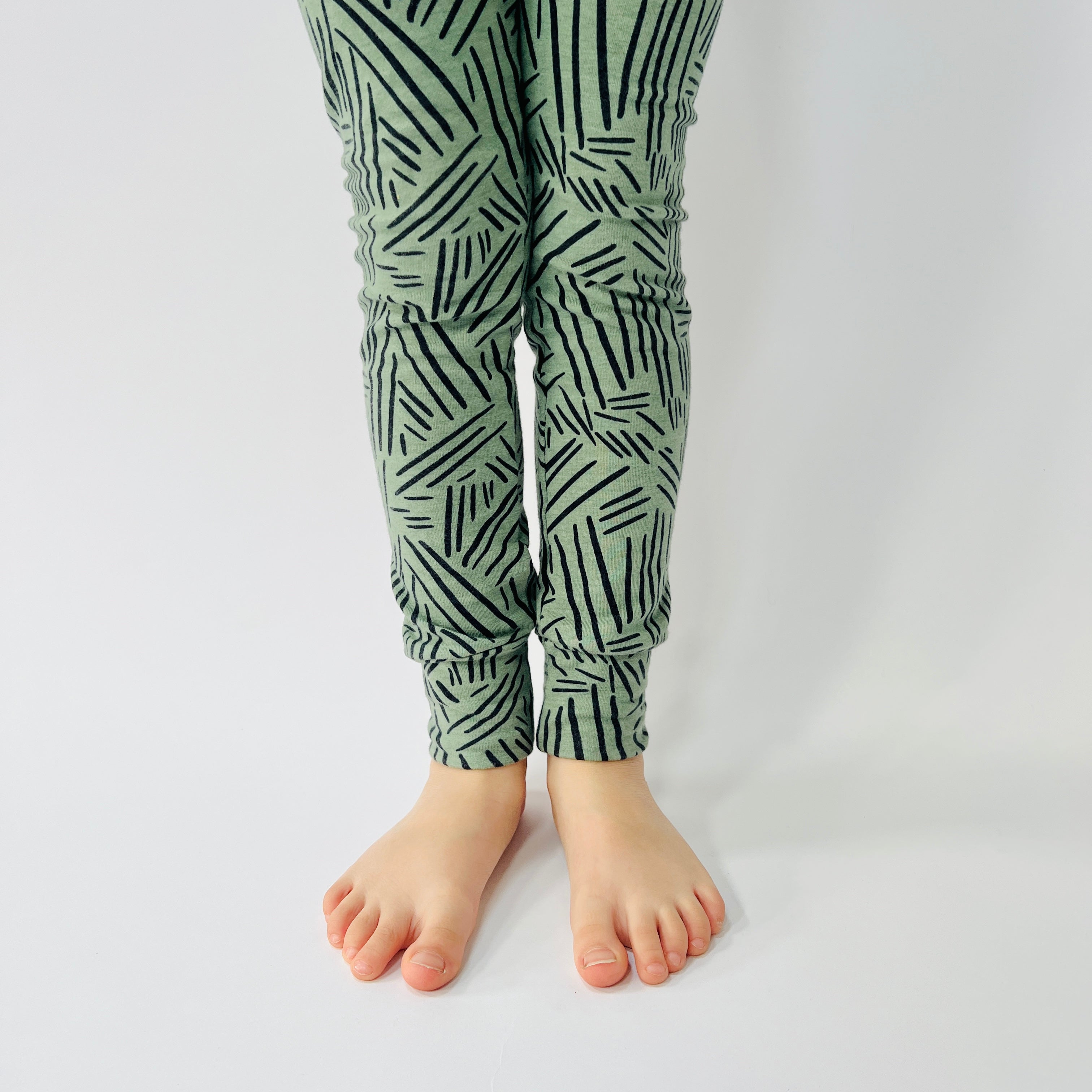 Eddie & Bee organic cotton leggings in Sage Green "Bamboo sticks" print.