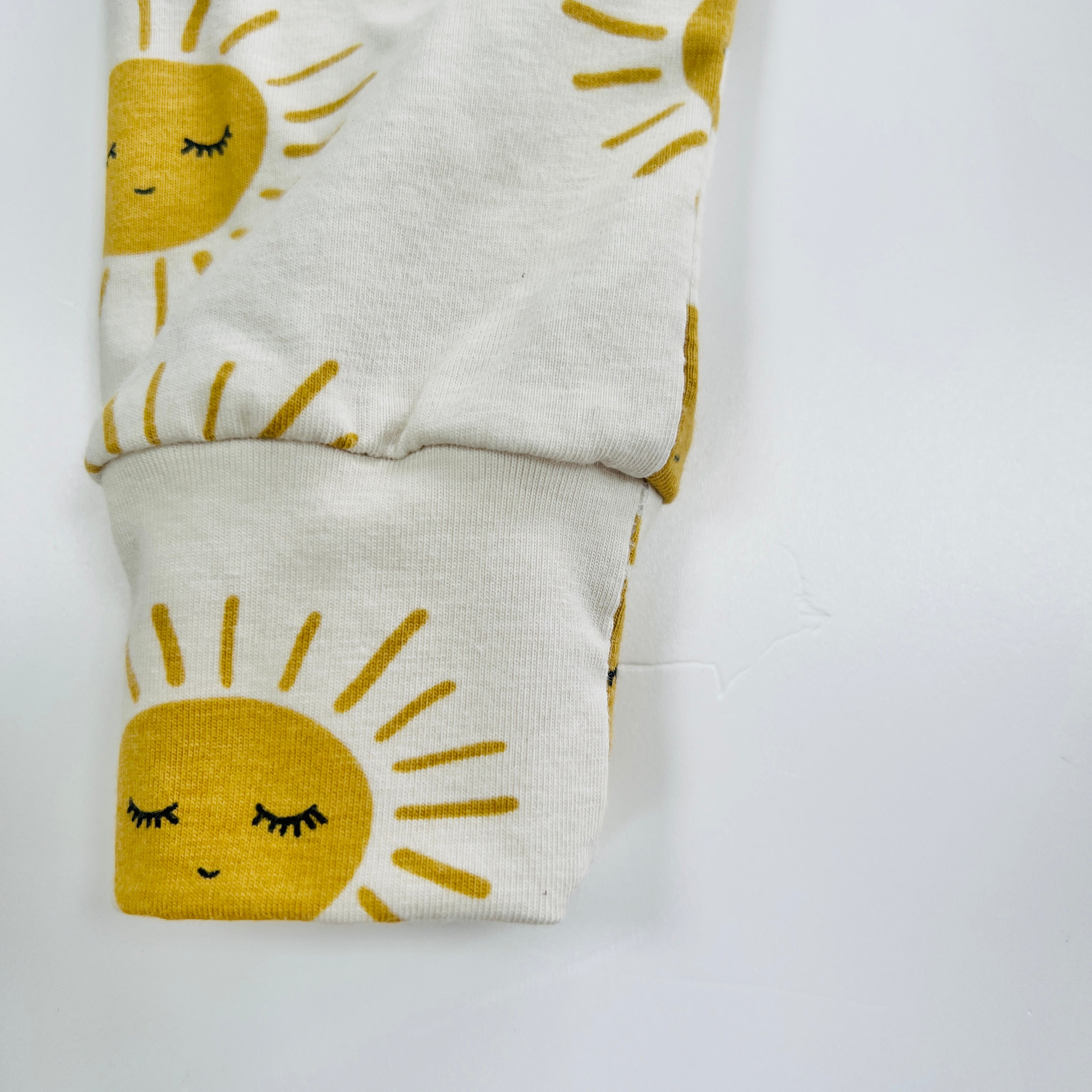 Eddie & Bee organic cotton leggings in Oat “Sunny" print.