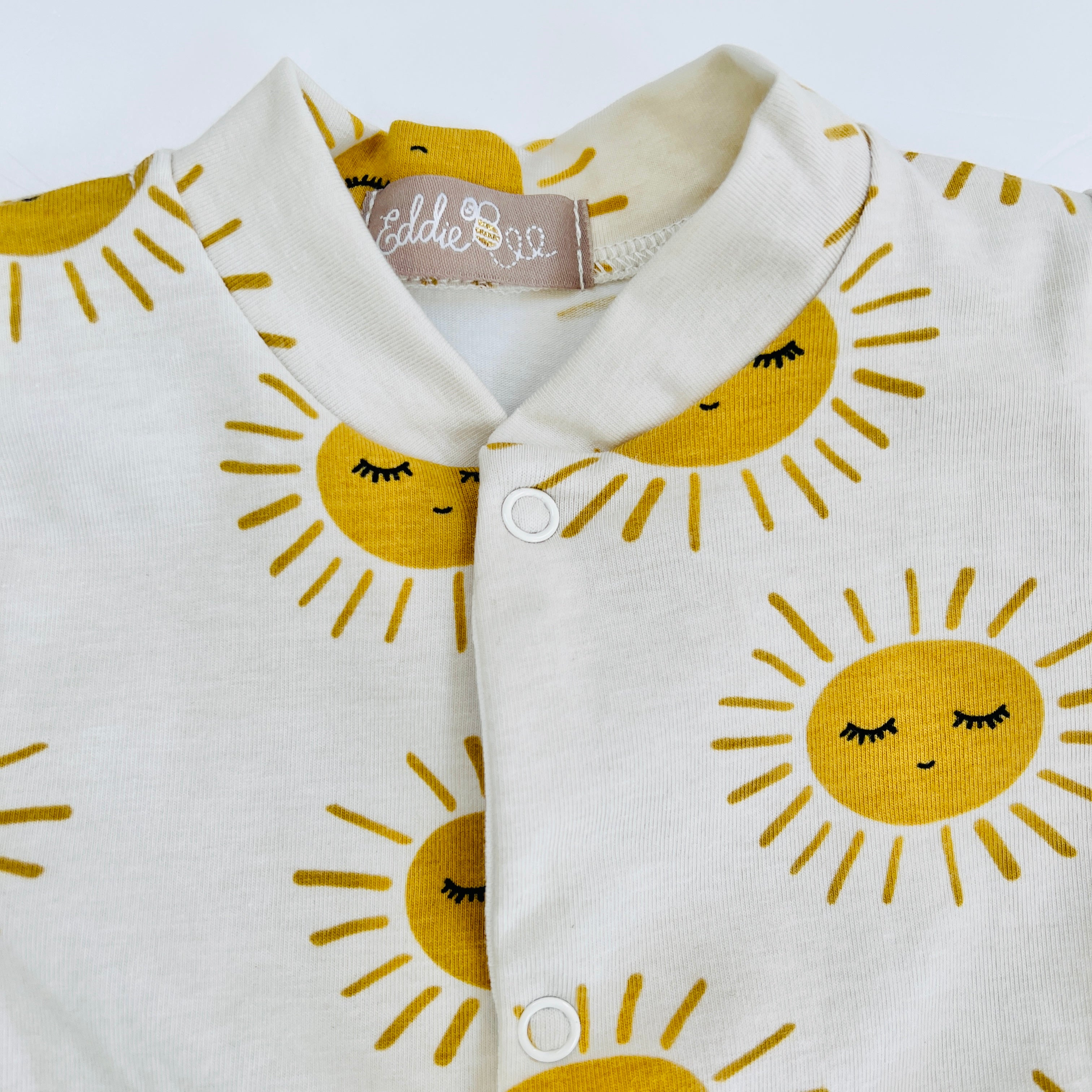 Eddie & Bee organic cotton Baby sleep suit  in Oat " Sunny " print.