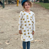 Eddie & Bee organic cotton long sleeved dress in Oat “Sunny” print