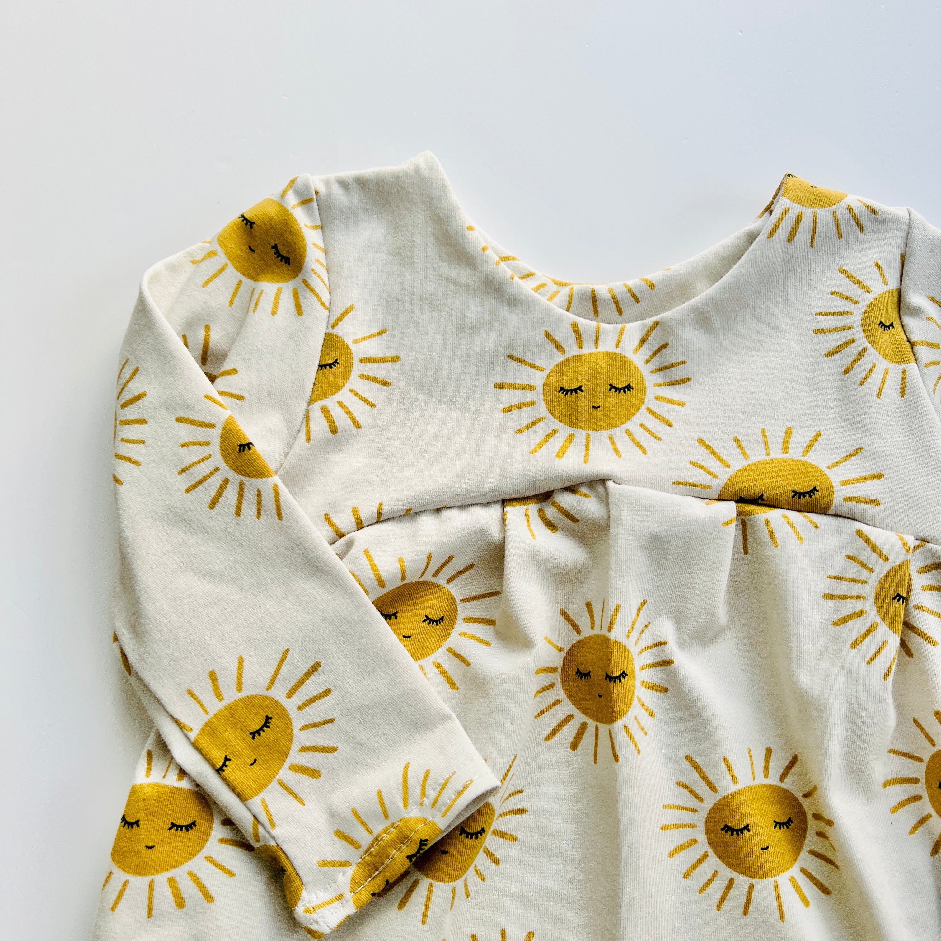 Eddie & Bee organic cotton long sleeved dress in Oat “Sunny” print