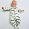 Pre-order for delivery end of September - Eddie & Bee organic cotton Baby sleep suit  in Cream " Enormous Crocodile" print.