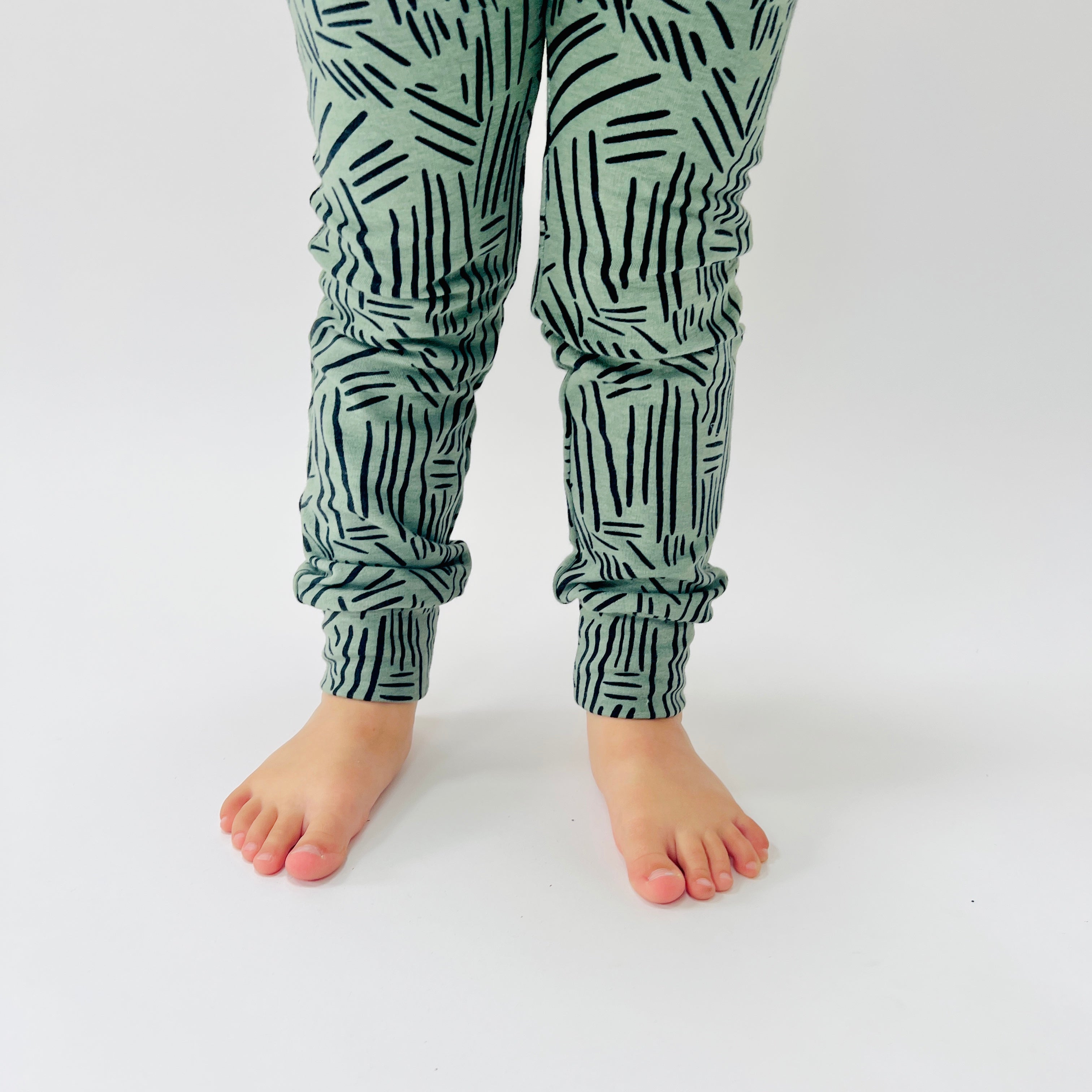 Eddie & Bee organic cotton leggings in Sage Green "Bamboo sticks" print.