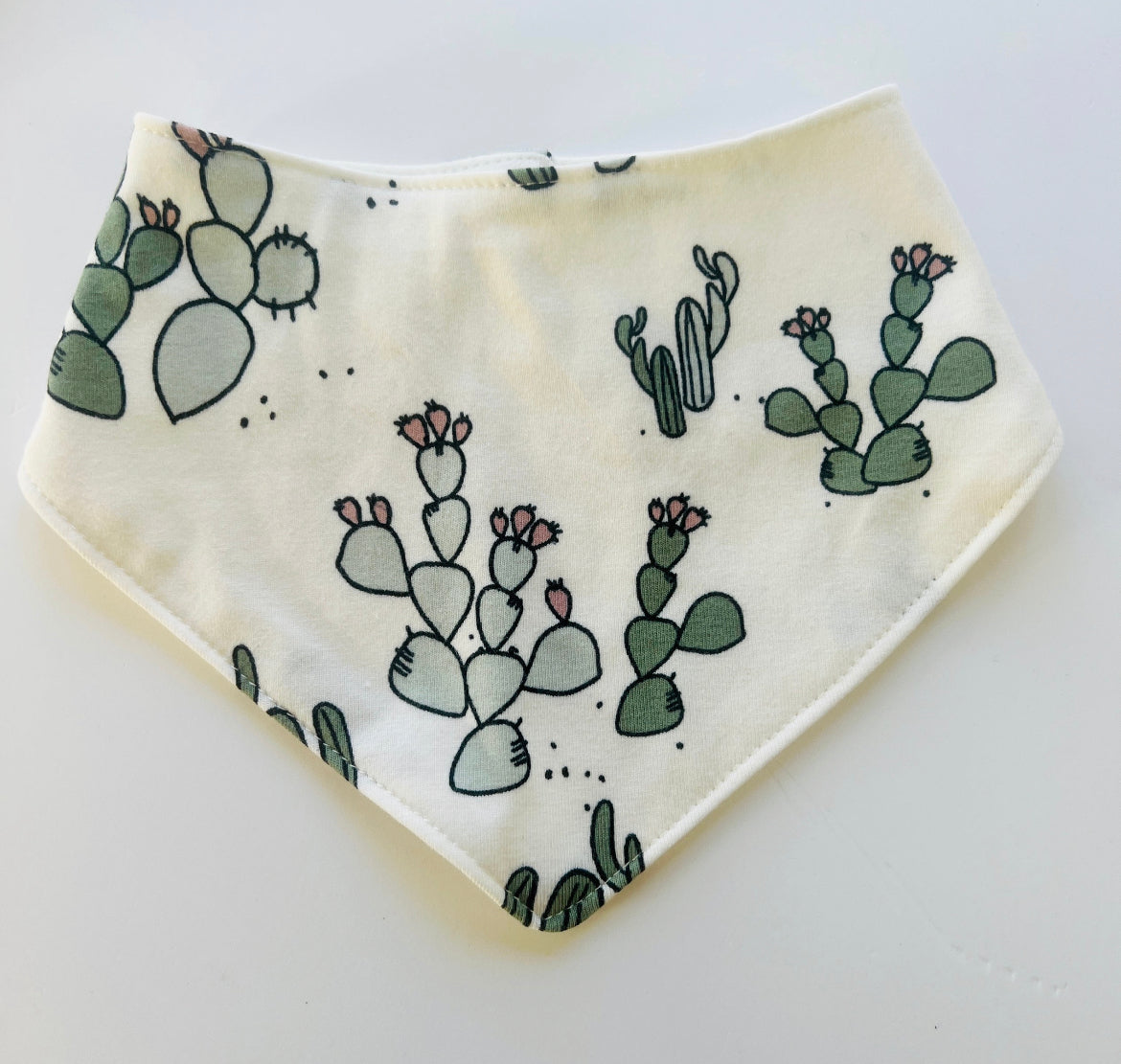 Eddie & Bee organic cotton Baby Dribble bib  in Cream "Cactus" print.