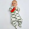 Pre-order for delivery end of September - Eddie & Bee organic cotton Baby sleep suit  in Cream " Enormous Crocodile" print.