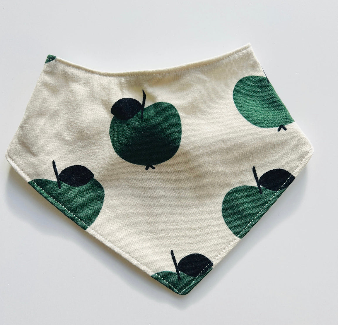Eddie & Bee organic cotton Baby Dribble bib  in Oat "Apple" print.